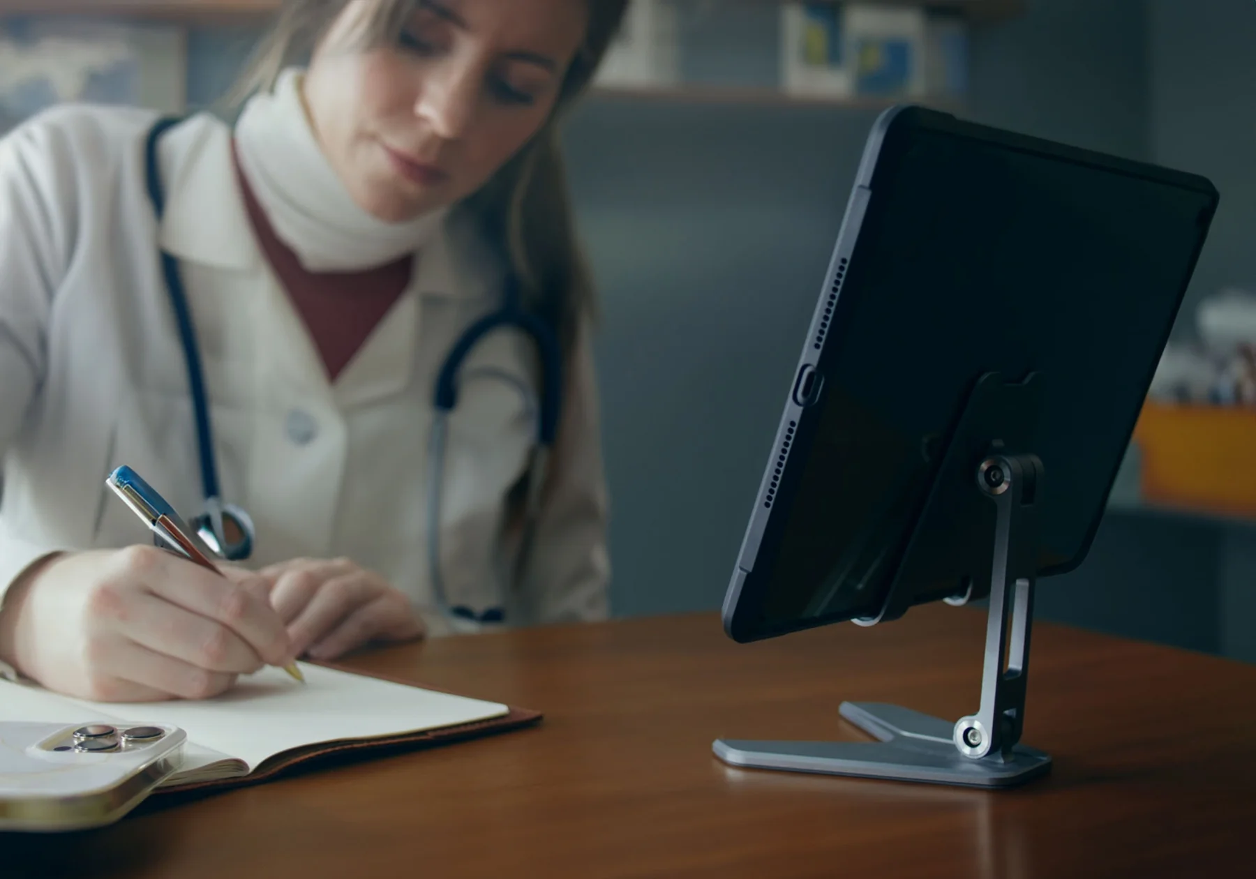 Healthcare professional using a tablet workstation